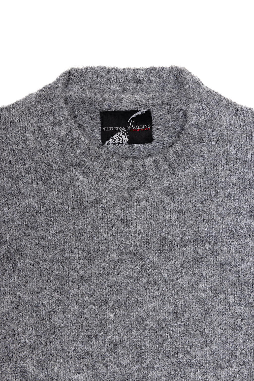 Umbra Sweater Gris — détail étiquette — Sutur.